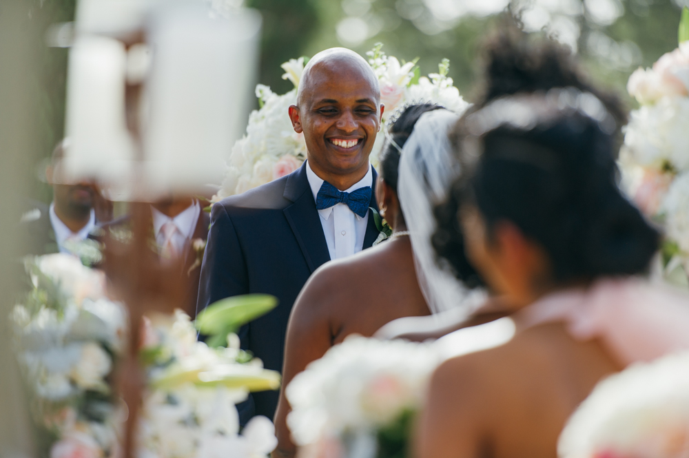 Groom smiles at the bride who is facing him/facing away from the camera.

Luxury Texas Wedding Photographer. Timeless Wedding Photography. Wedding in Texas. Destination Wedding Photographer.