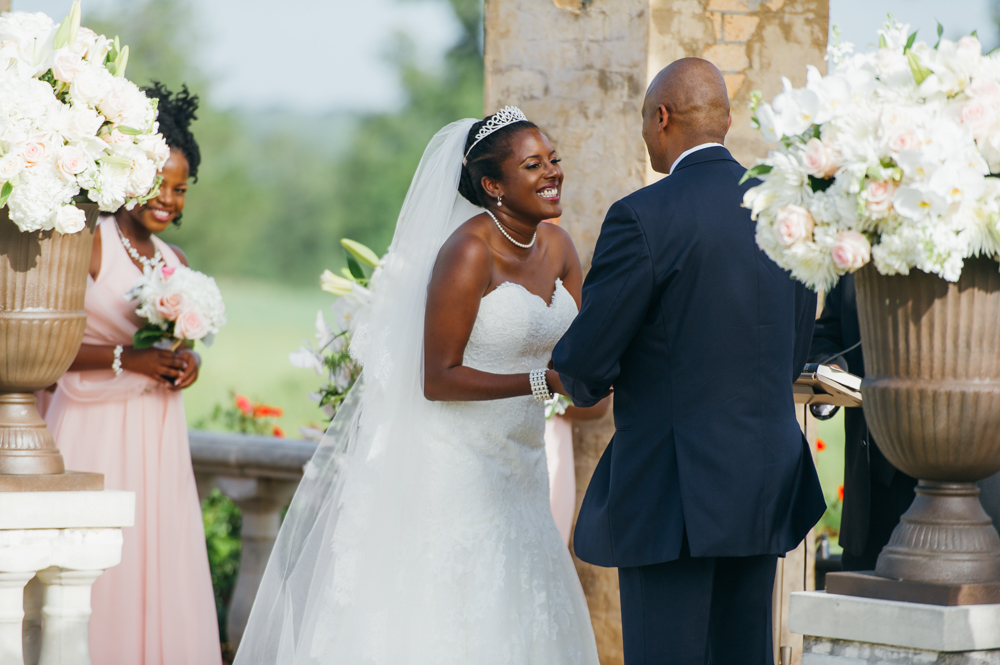 Bride is facing the groom at the altar and is smiling.

Luxury Texas Wedding Photographer. Timeless Wedding Photography. Wedding in Texas. Destination Wedding Photographer.