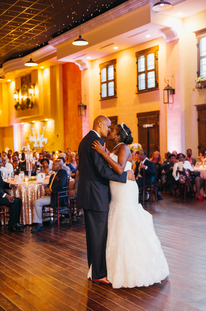 Bride and groom dance in each other's arms on the dance floor at their reception and kiss.

Luxury Texas Wedding Photographer. Timeless Wedding Photography. Wedding in Texas. Destination Wedding Photographer.