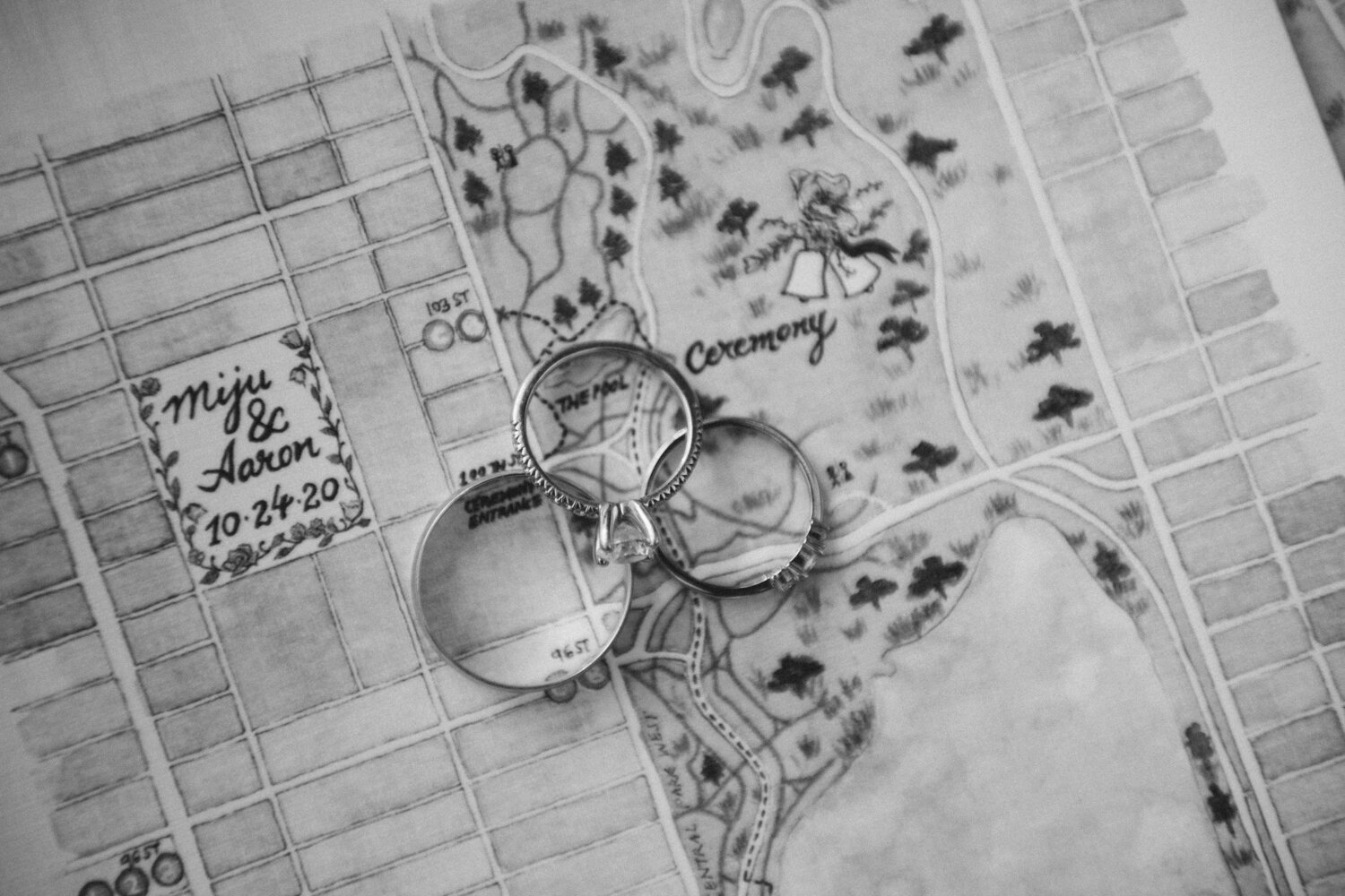 Close-up image of the wedding rings and engagement ring sitting on top of a map of Central Park with marked locations for the ceremony.

Central Park Wedding Photography. Williamsburg Bridge Bridal Portraits. Luxury NYC Wedding Photographer. Manhattan Micro Wedding.