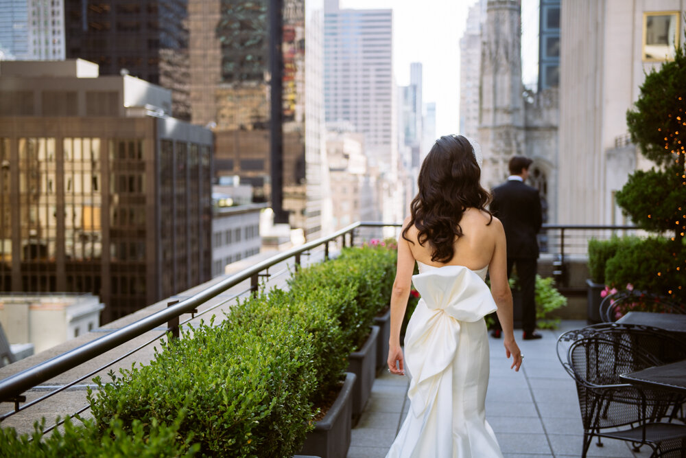 Bride approached the groom from behind on a Manhattan terrace.

University Club Wedding Photographer. Manhattan Luxury Wedding Photographer. Manhattan Bridal Portraits. Luxury Local Wedding NYC. 