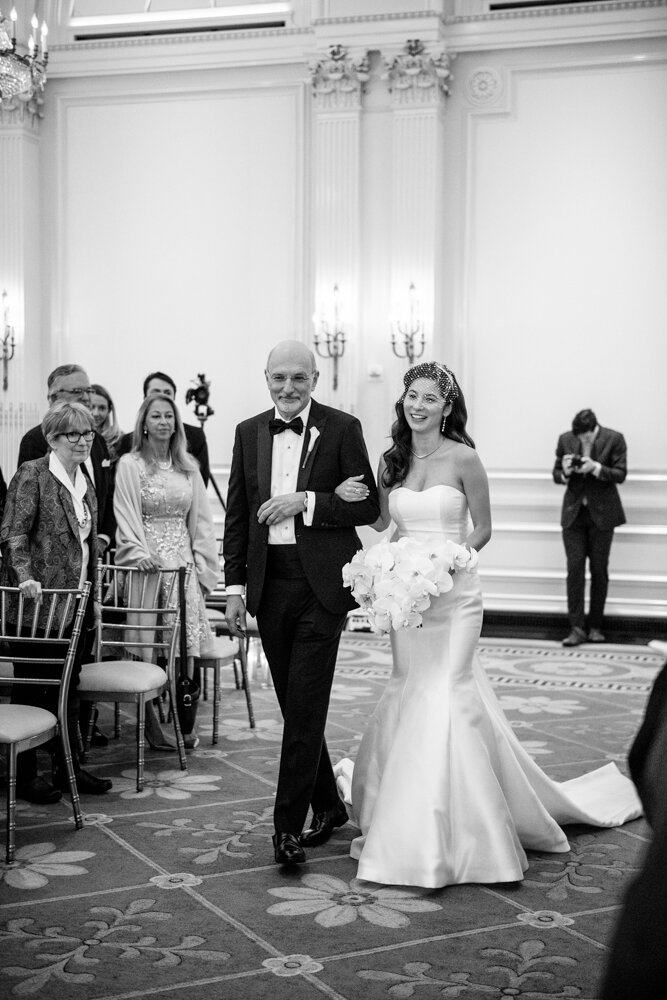 Bride walks down the aisle with her father.

University Club Wedding Photographer. Manhattan Luxury Wedding Photographer. Manhattan Bridal Portraits. Luxury Local Wedding NYC. 