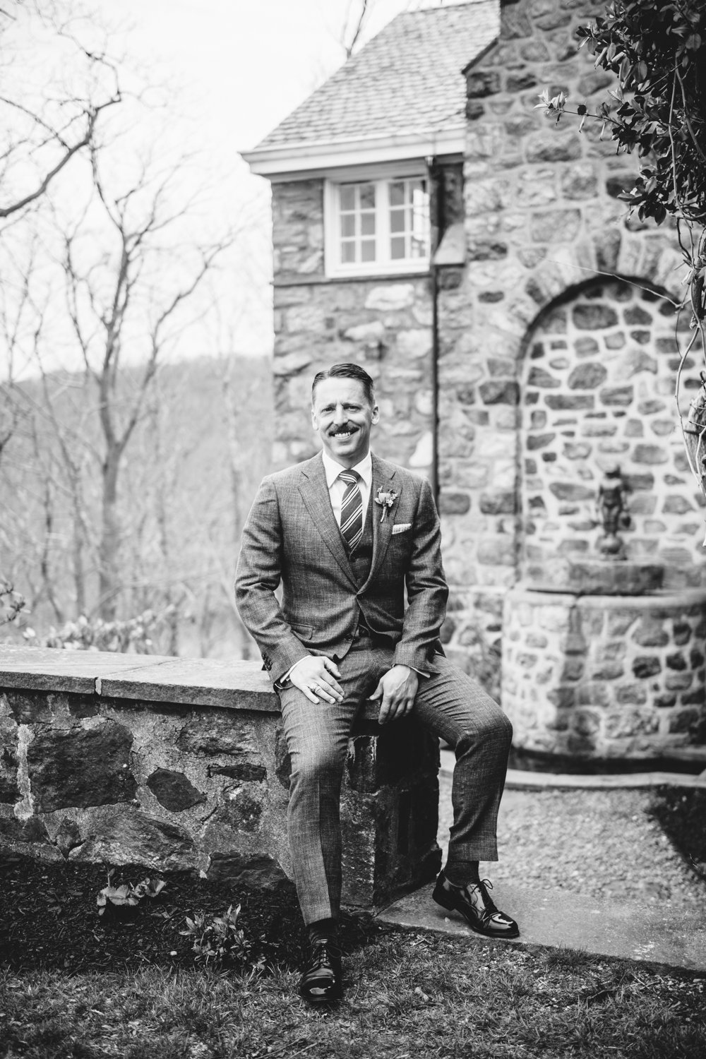 Groom sits on a stone wall in front of a stone building and smiles.

Upstate New York Wedding Photography. Cold Spring NY Wedding Photography. Luxury Local Wedding Photographer. Destination Wedding Photographer.