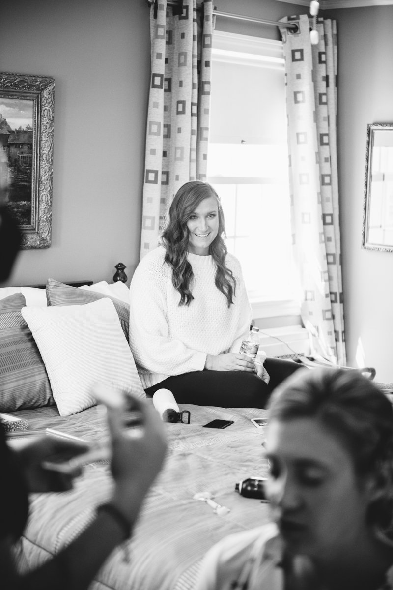 Bridesmaid in focus int he background smiling looking at the bride, who is out of focus in the foreground getting her makeup done.

New York Wedding Photography. Long Island Wedding Photography. Luxury Local Wedding Photographer. Destination Wedding Photographer.