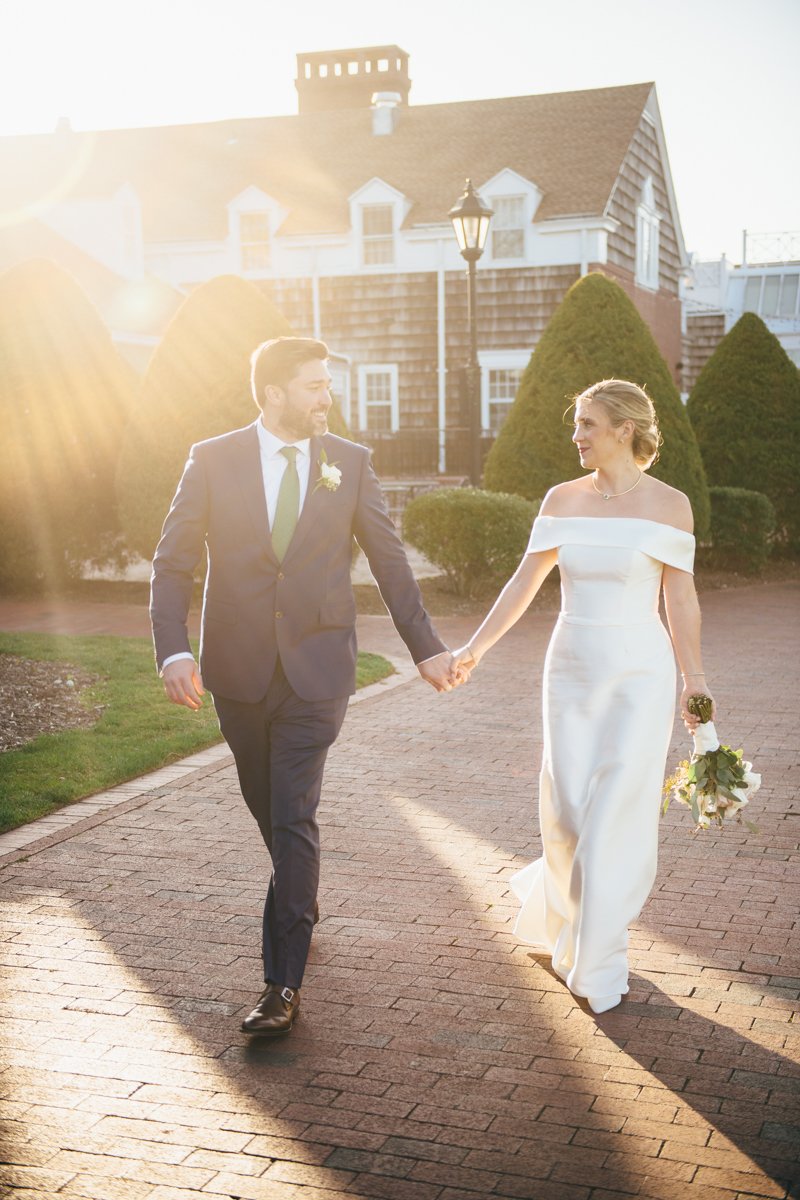 Bride and groom look at each other and smile as they hold hands and walk down a brick pathway.

New York Wedding Photography. Long Island Wedding Photography. Luxury Local Wedding Photographer. Destination Wedding Photographer.