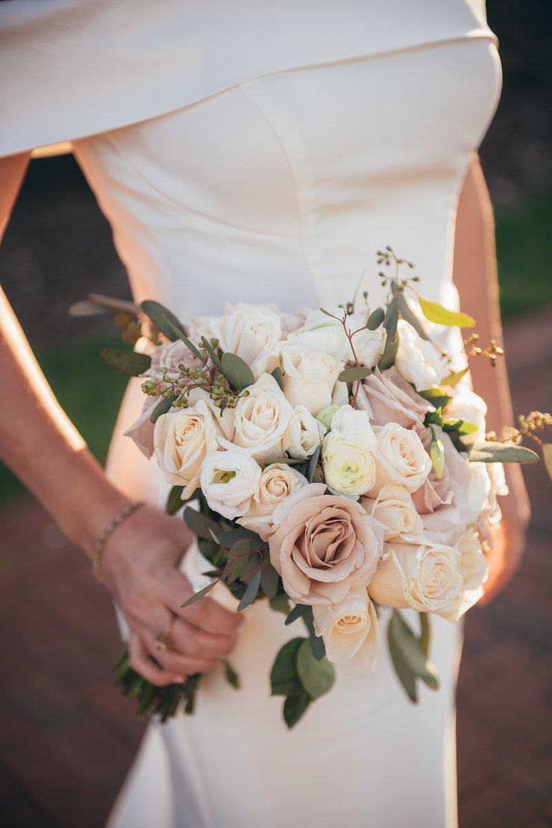 Detail shot of the bride's wedding bouquet of white and pink roses.

New York Wedding Photography. Long Island Wedding Photography. Luxury Local Wedding Photographer. Destination Wedding Photographer.
