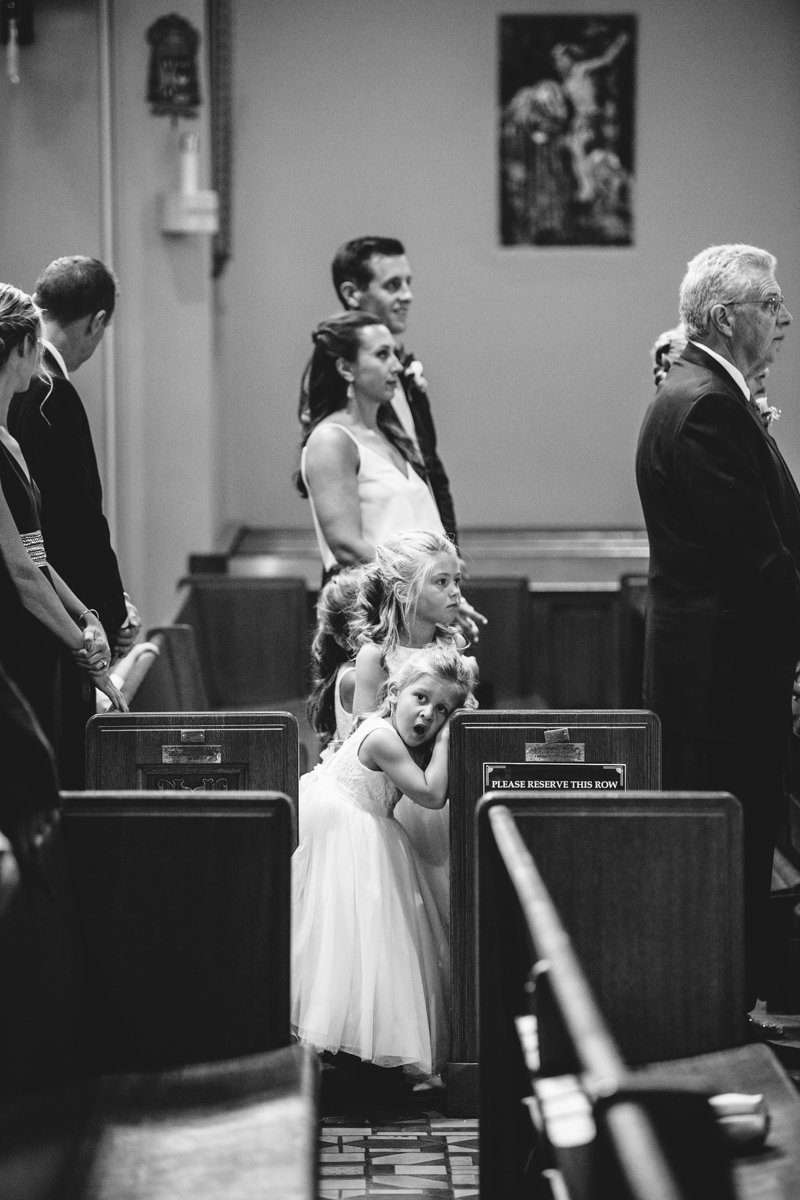 Flower girl leans on a church pew surrounded by standing wedding guests and yawns.

New York Wedding Photography. Long Island Wedding Photography. Luxury Local Wedding Photographer. Destination Wedding Photographer.
