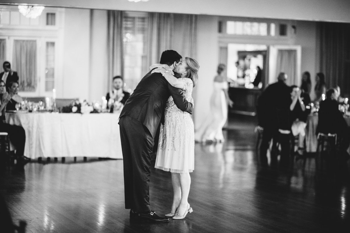 Man leans down to hug a woman on the dance floor at the wedding reception.

New York Wedding Photography. Long Island Wedding Photography. Luxury Local Wedding Photographer. Destination Wedding Photographer.