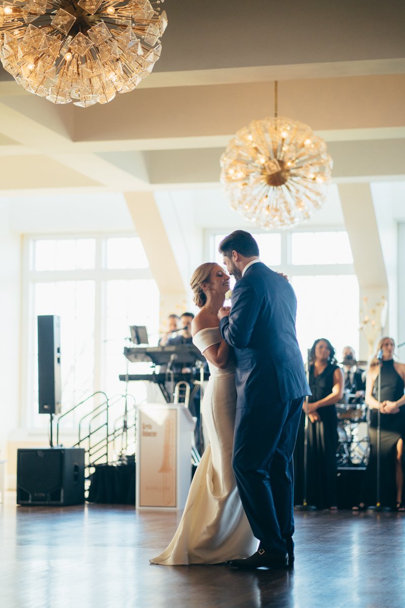 Bride and groom hold each other close as they dance alone on the dance floor.

New York Wedding Photography. Long Island Wedding Photography. Luxury Local Wedding Photographer. Destination Wedding Photographer.