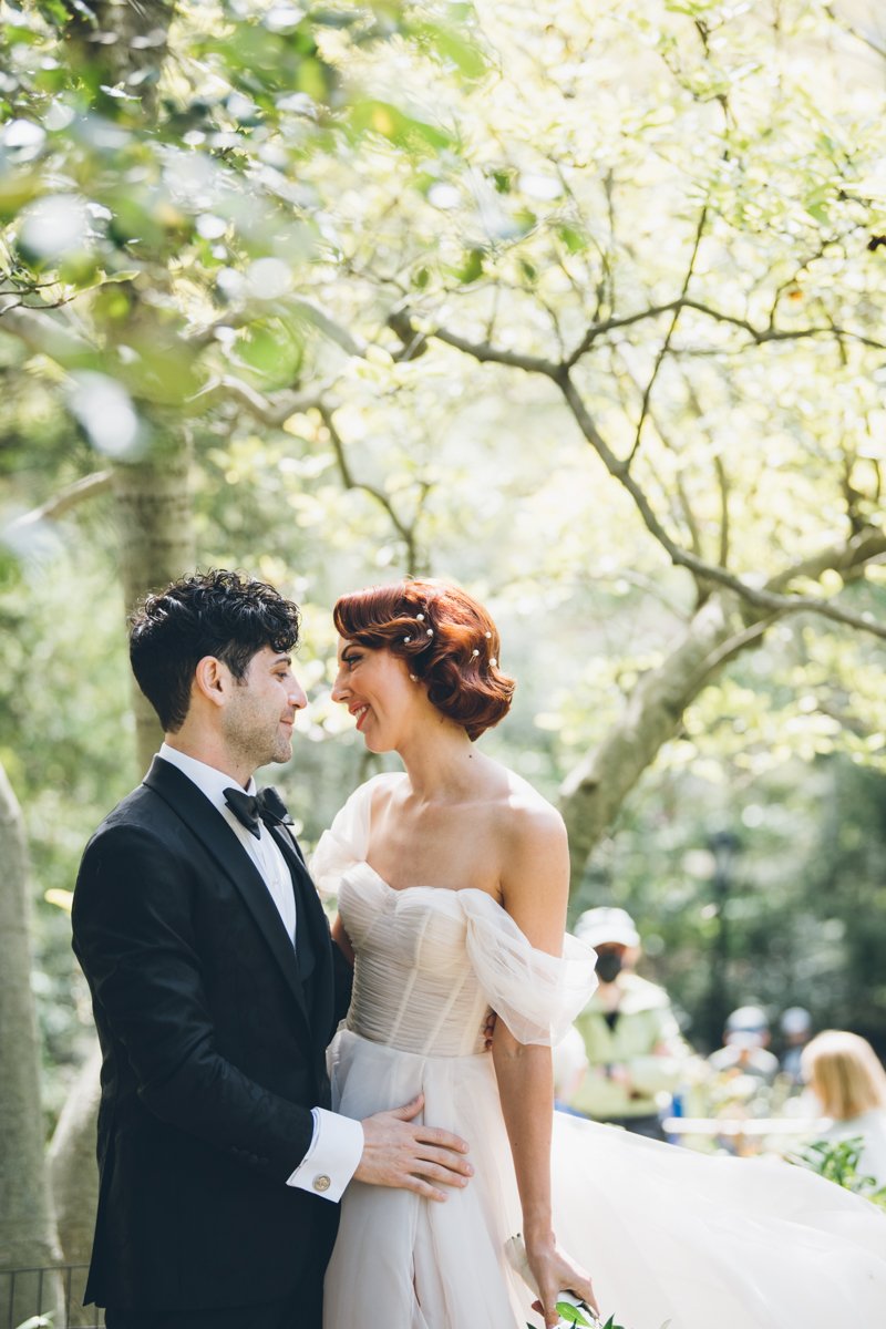 Bride and groom look at each other and smile, surrounded by trees.

Manhattan Wedding Photographer. New York Wedding Photographer. New York Historical Society Wedding. NY Historical Society Weddings.