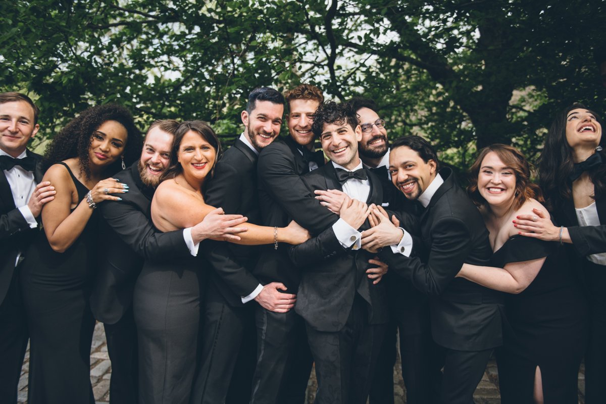 Groom and his bridal party stand next to each other, with arms all around each other.

Manhattan Wedding Photographer. New York Wedding Photographer. New York Historical Society Wedding. NY Historical Society Weddings.