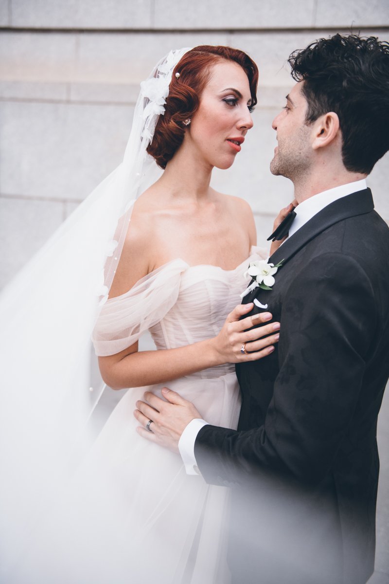 Bride and groom face each other and look at each other lovingly outside the NY Historical Society. 

Manhattan Wedding Photographer. New York Wedding Photographer. New York Historical Society Wedding. NY Historical Society Weddings.