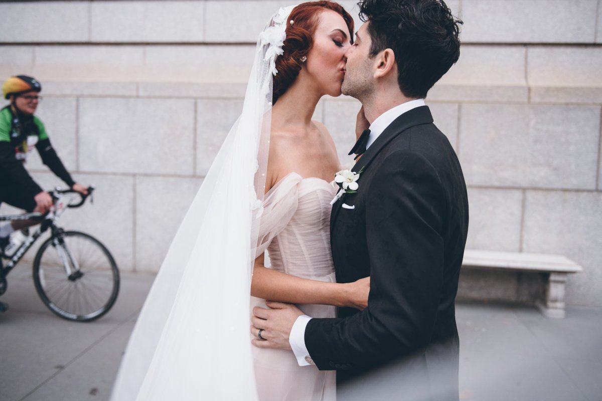 Bride and groom kiss on the sidewalk outside the NY Historical Society.

Manhattan Wedding Photographer. New York Wedding Photographer. New York Historical Society Wedding. NY Historical Society Weddings.