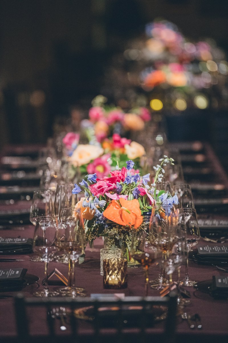 Colorful bouquets and empty wine glasses on a long table.

Manhattan Wedding Photographer. New York Wedding Photographer. New York Historical Society Wedding. NY Historical Society Weddings.