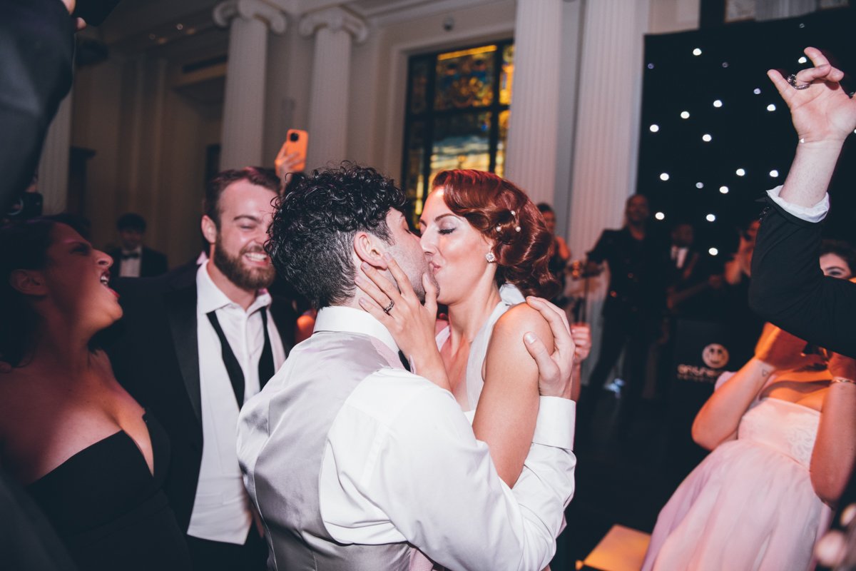 Bride and groom kiss on the dance floor at the New York Historical Society.

Manhattan Wedding Photographer. New York Wedding Photographer. New York Historical Society Wedding. NY Historical Society Weddings.