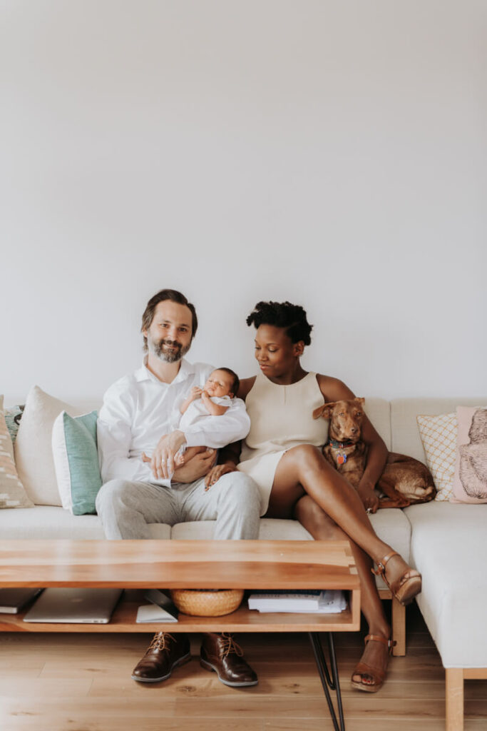 Mother and father sit on the couch with their newborn baby and their dog.

Newborn Photography. Brooklyn Newborn Portraits. Lifestyle Newborn Photographer. Brooklyn Family Photography.