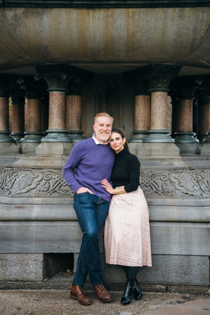 Husband and wife stand next to each other as she leans on his shoulder. Photographed in Central Park.

Manhattan Family Portraits. Central Park Family Photography. NYC Family Photographer.