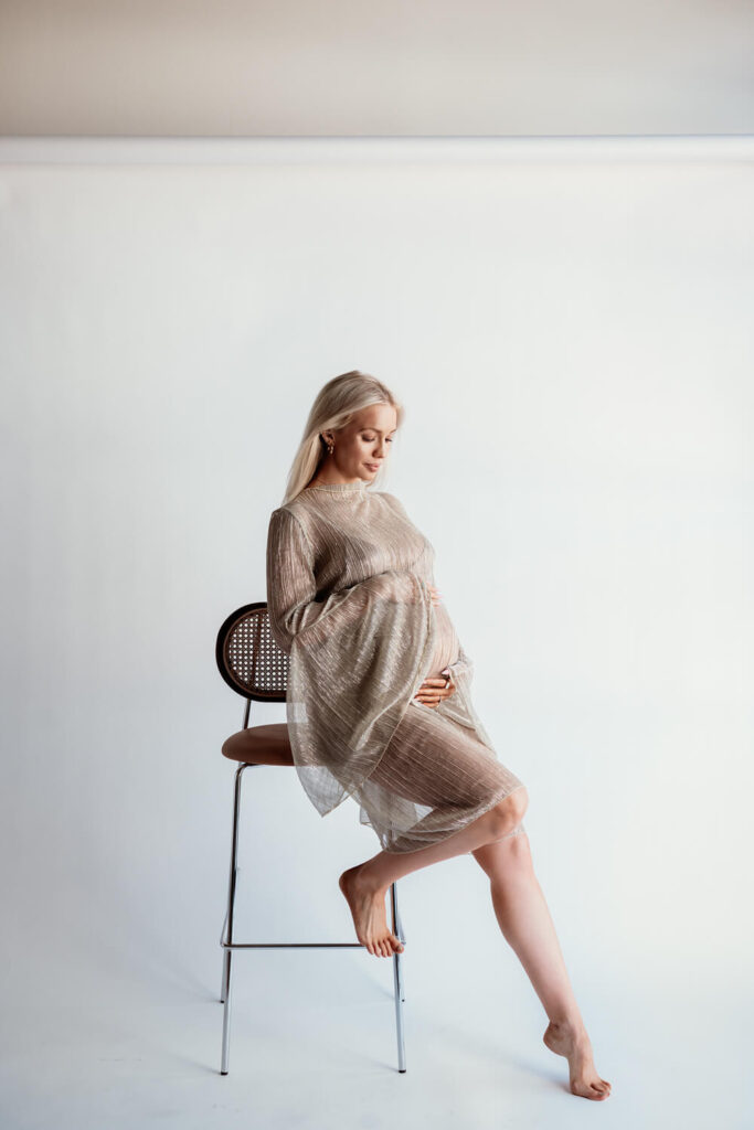 Gigi Hadid inspired maternity dress for natural light studio pregnancy photos photographed by Austin maternity photographer Kat Harris