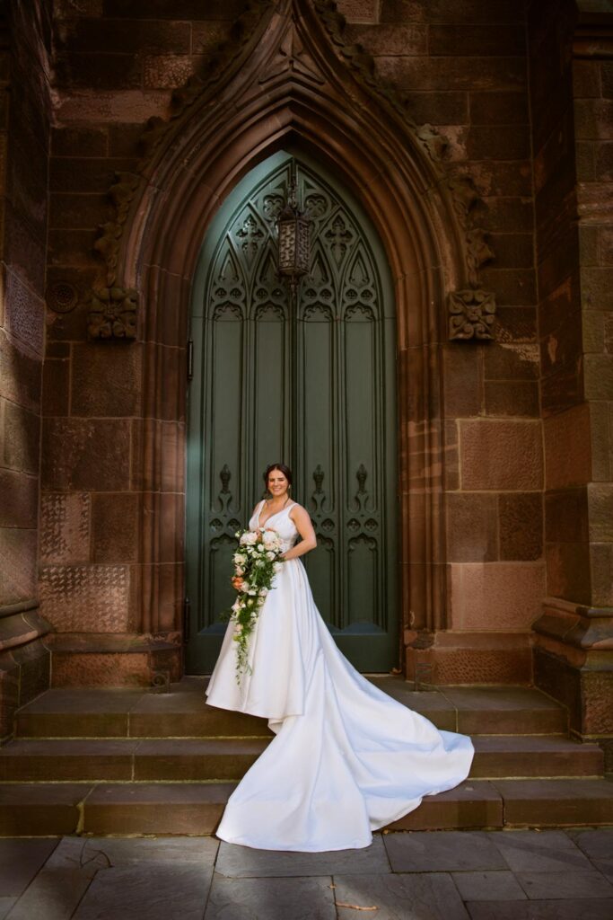 Portrait of the bride outside of First Presbyterian Church on 5th ave photographed by New York City wedding photographer Kat Harris.